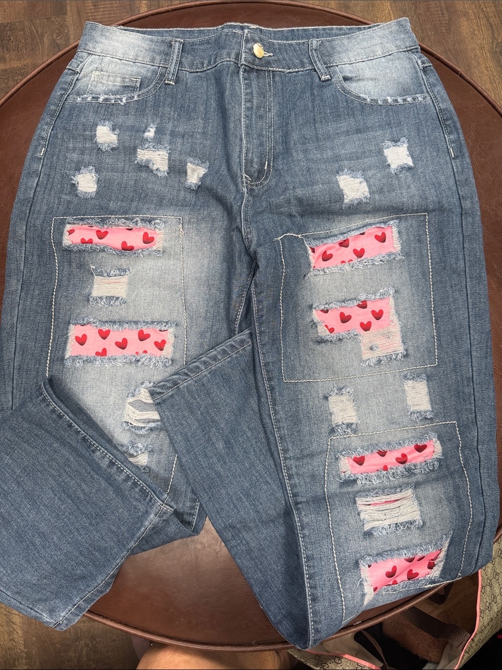 Women’s Distressed Blue Jeans with Pink Heart Patch Details